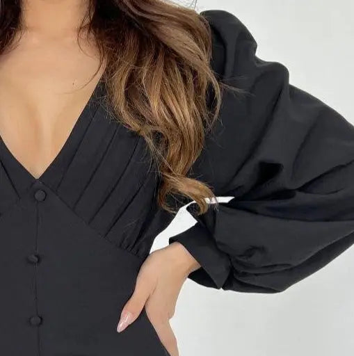 Elegantes schwarzes Abendkleid mit Rückenausschnitt Fame